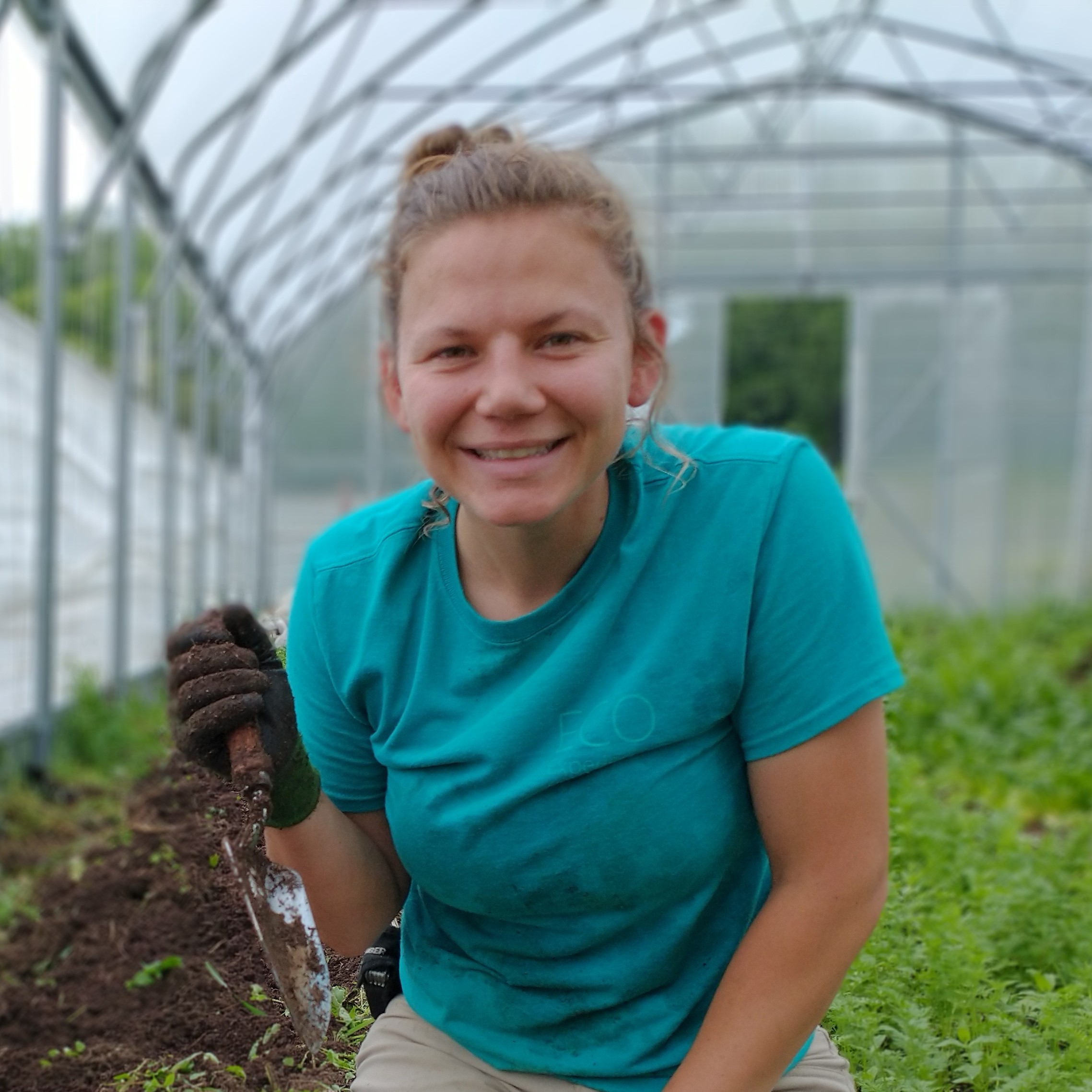 laura-planting-in-high-tunnel